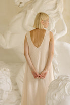 Beige polka dot maxi dress Nantucket summer outfit 2026, old money aesthetic cotton dress for harbor dinner, coastal getaway, and quiet luxury style