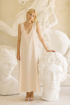 Beige textured maxi dress bridal shower outfit idea spring 2026, neutral elegant cotton dress for bridesmaids luncheon and outdoor garden party