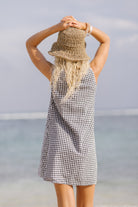 Black and white gingham mini Gili dress — fresh summer style in reversible cotton by Puka The Label