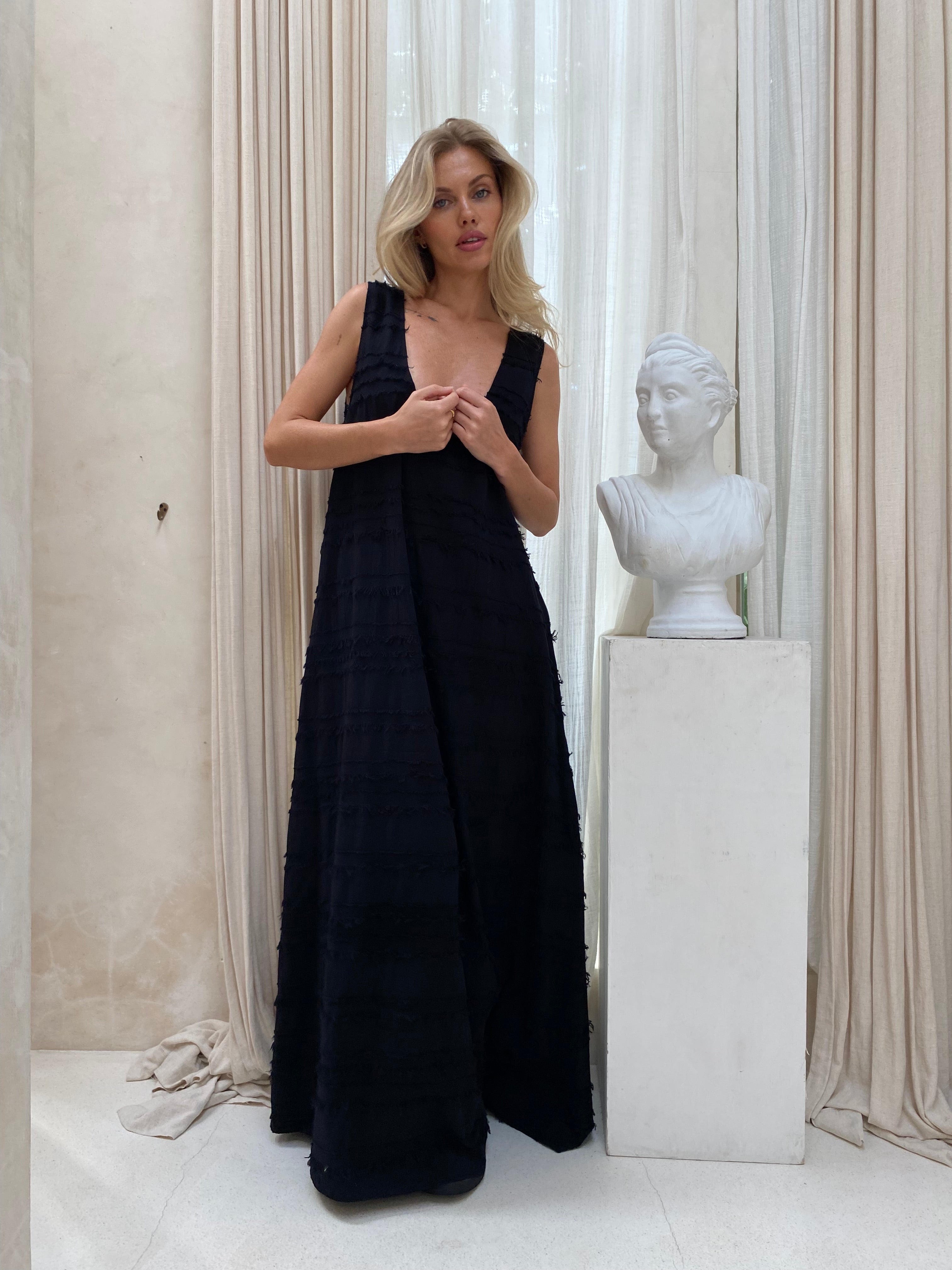 Chic black maxi dress NYE — New Year's Eve sophisticated city evening outfit