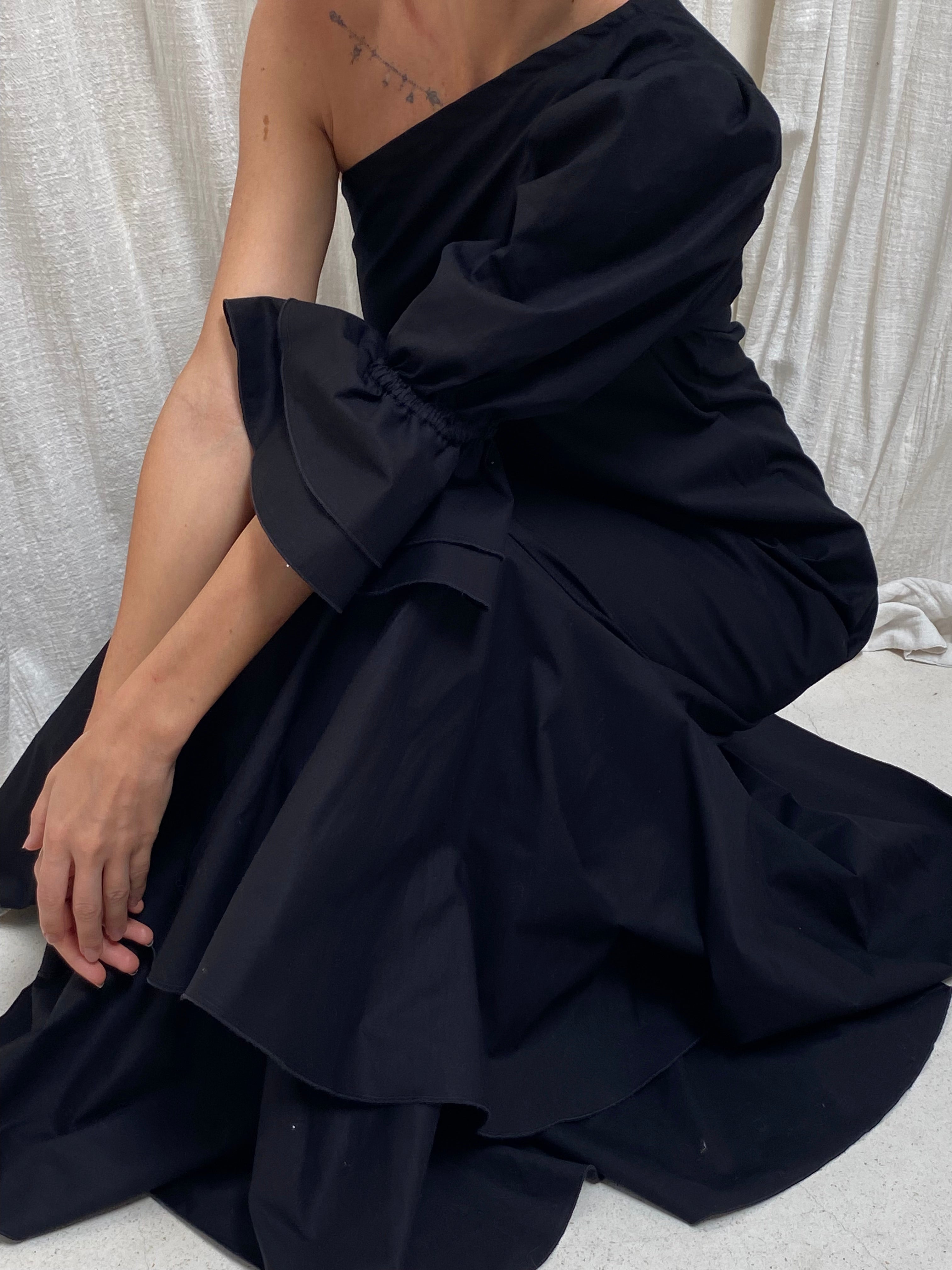 Black cotton maxi dress evening out and vacation outfit idea, versatile one shoulder ruffle dress day to night