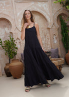 Black tiered cotton maxi dress rooftop party and bachelorette weekend outfit summer 2026, effortless flowy Waverly Dress for warm weather celebration