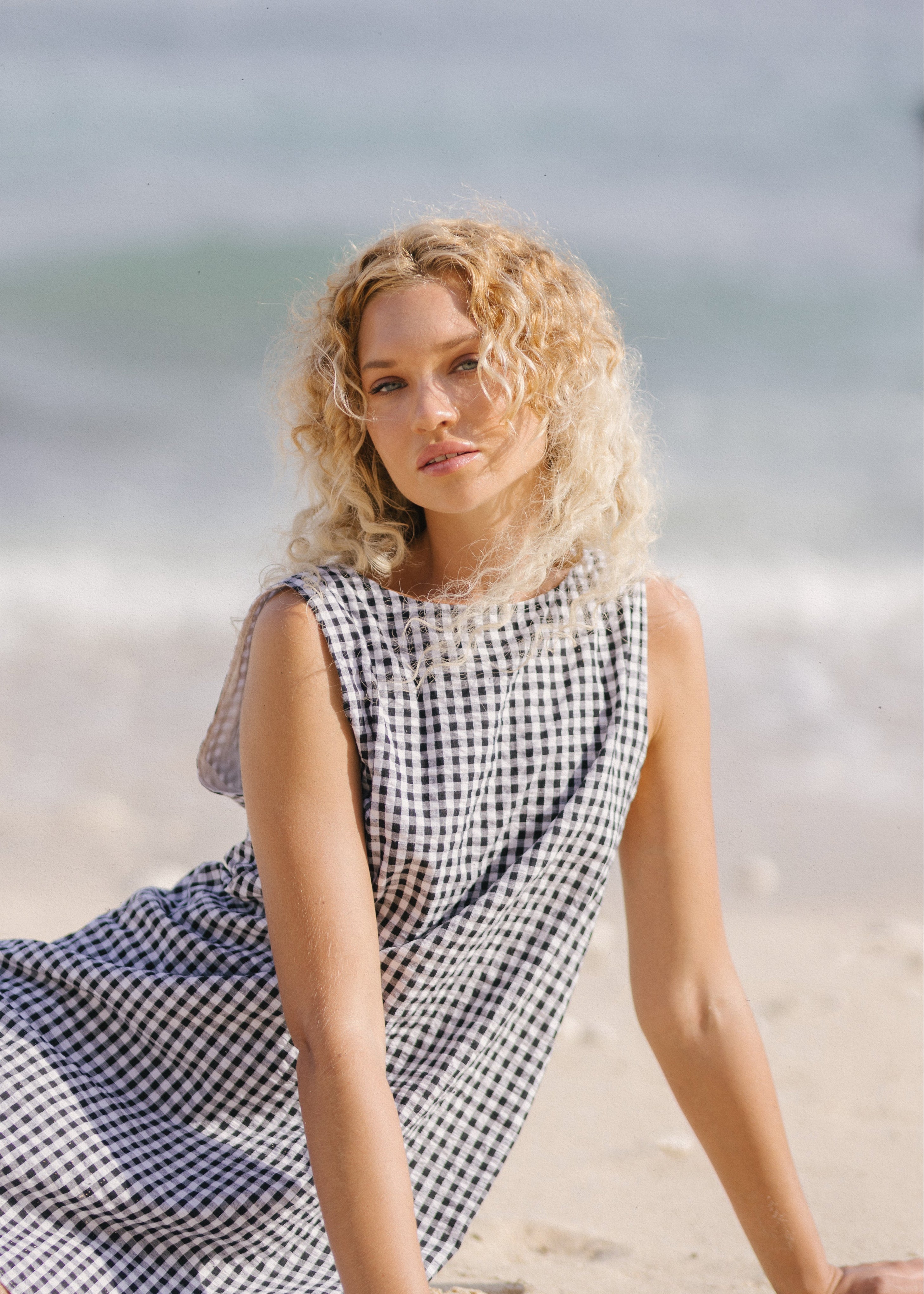 Back view of the black gingham Gili - breathable cotton maxi dress for petite women, effortlessly chic for Charleston weekends and coastal getaways
