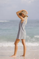 Black gingham mini Gili dress — a clean tennis club and beach club summer look by Puka The Label