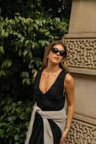 Textured black maxi dress V-neck — chic rehearsal dinner city to coastal