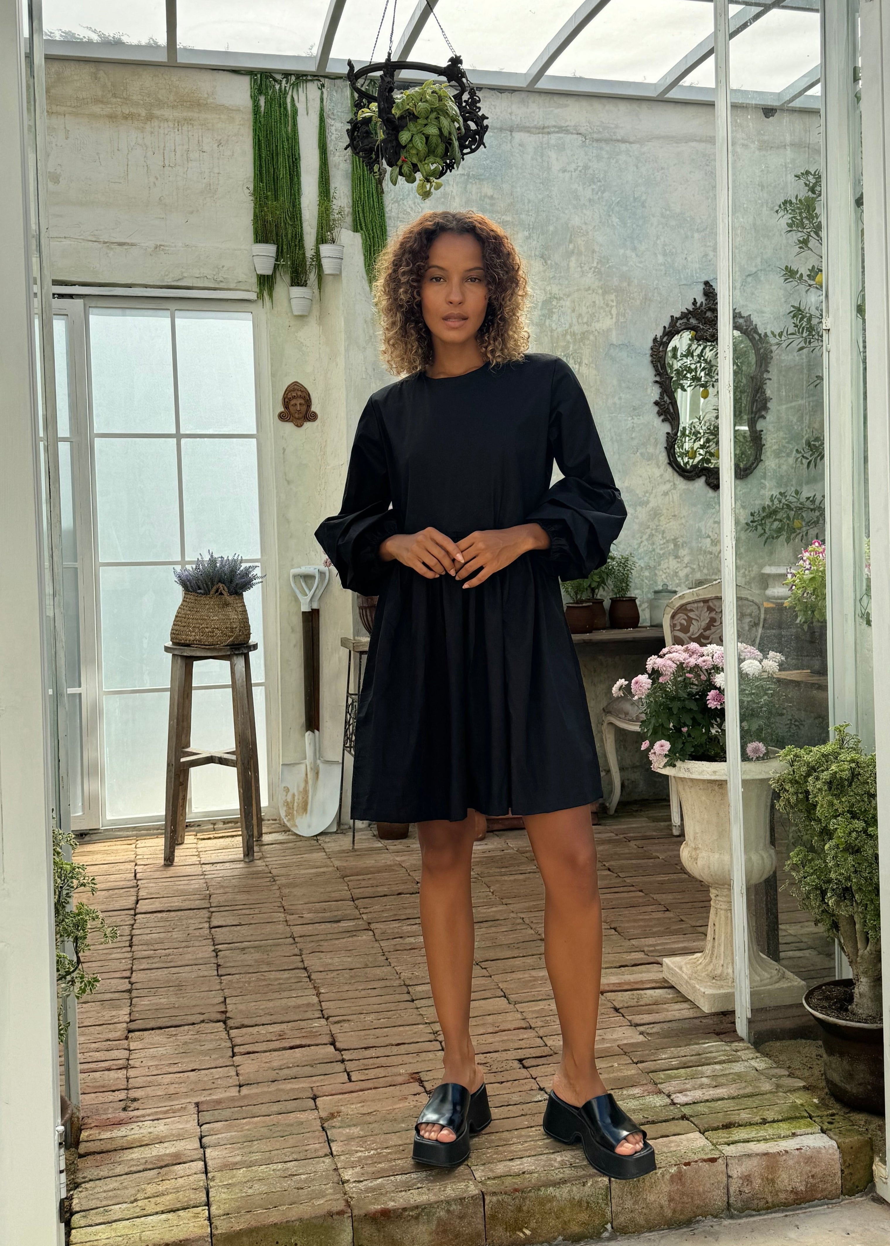 Black ruffle sleeve Nori Dress concert and summer night out outfit 2026, effortless cotton mini dress for evening occasion and going-out look