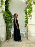 Sophisticated black maxi high neck — coastal grandmother city chic style
