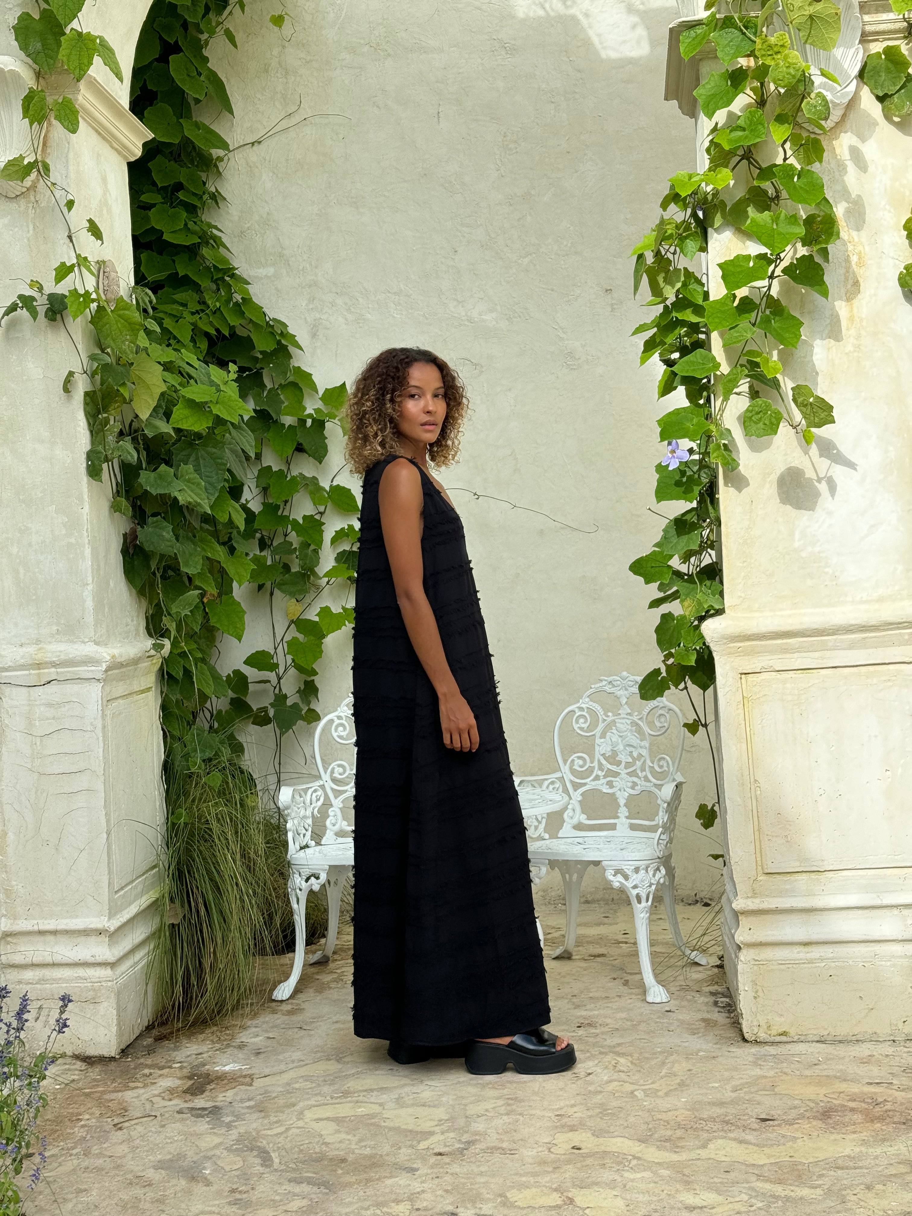 Sophisticated black maxi high neck — coastal grandmother city chic style