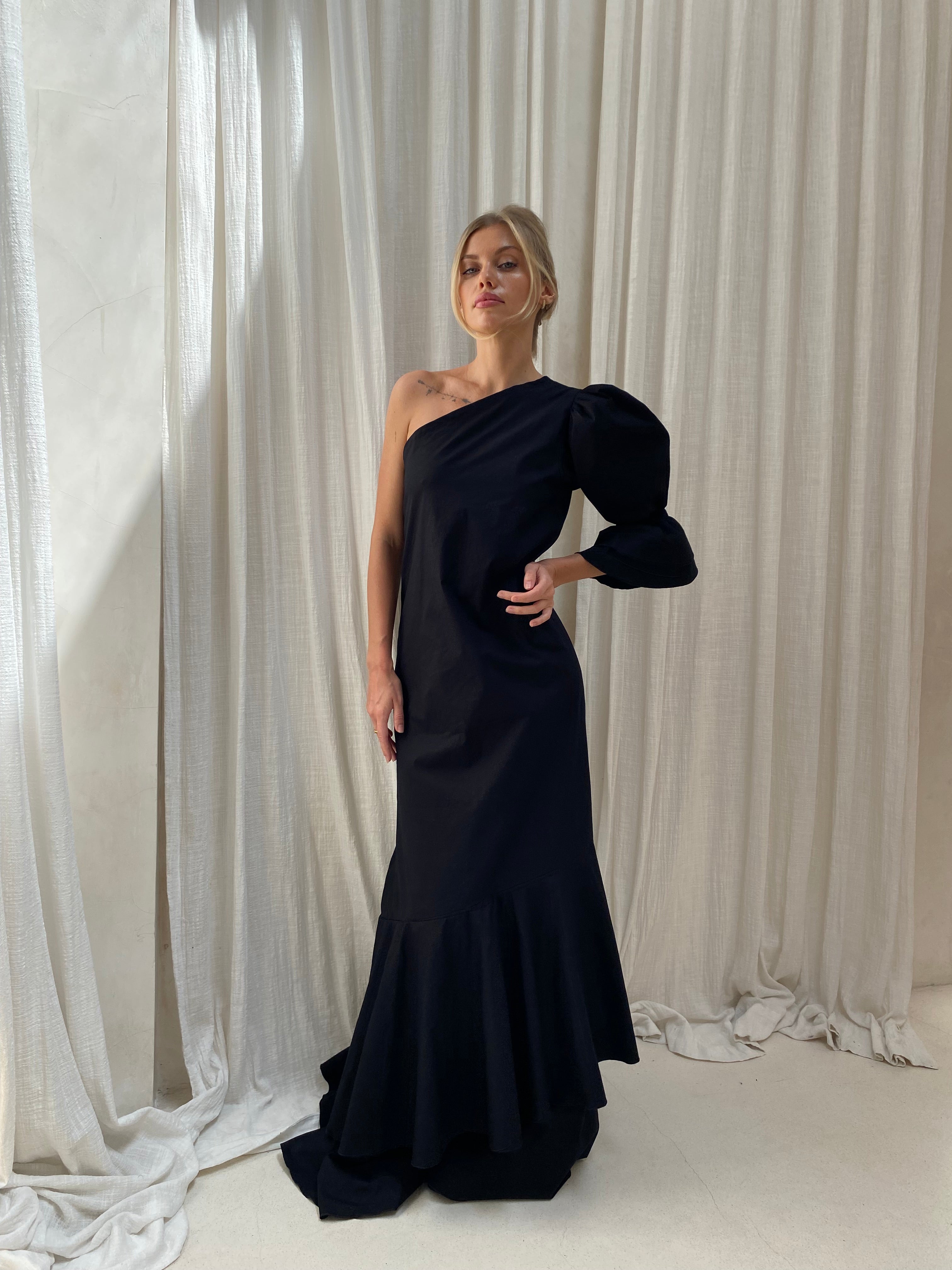 Chic black maxi dress holiday party and rehearsal dinner outfit idea, sophisticated one shoulder ruffle maxi 2026