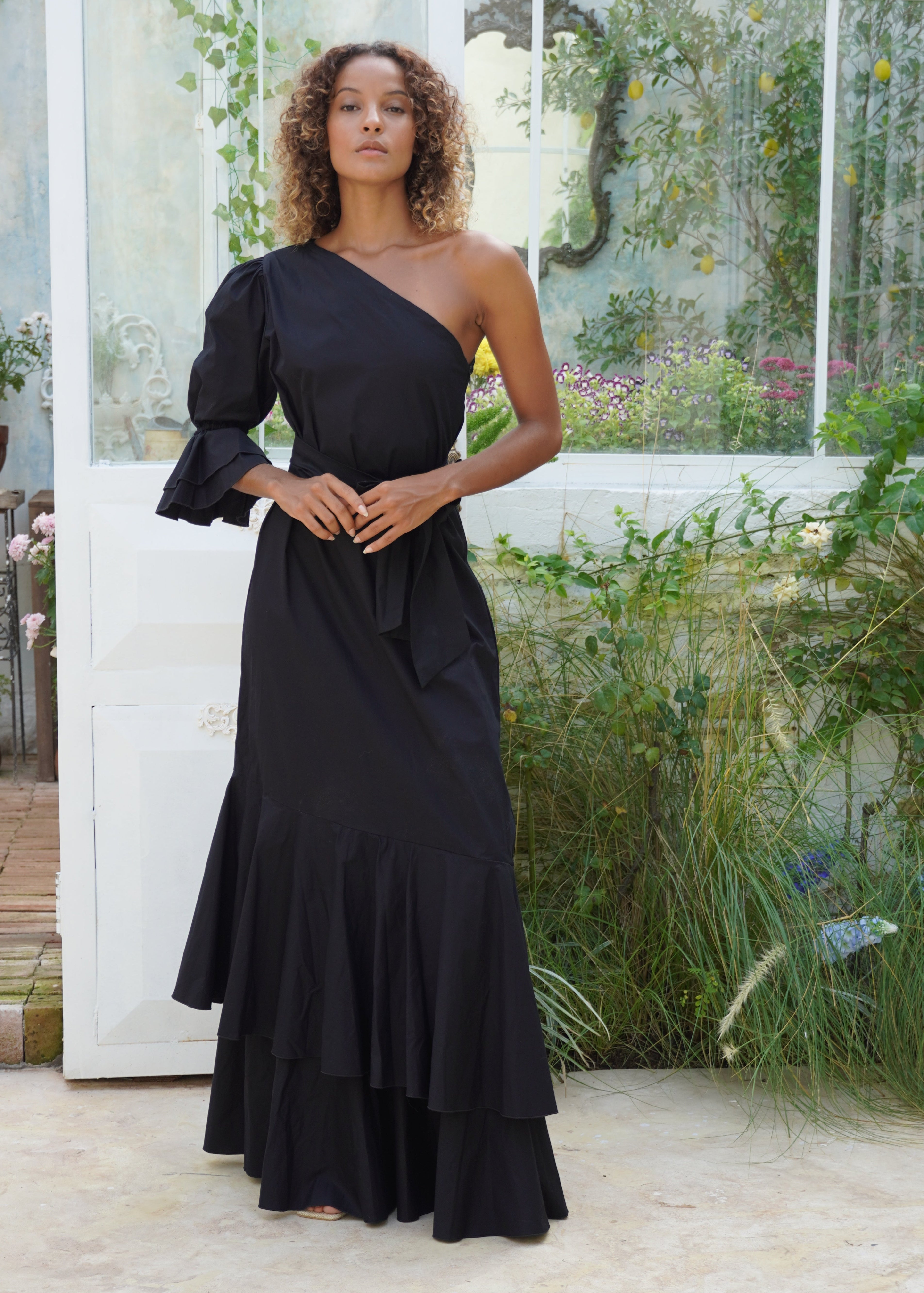 Black tie dress inspiration ruffle maxi, formal event outfit idea women elegant one shoulder cotton maxi Puka. CBK outfit inspiration