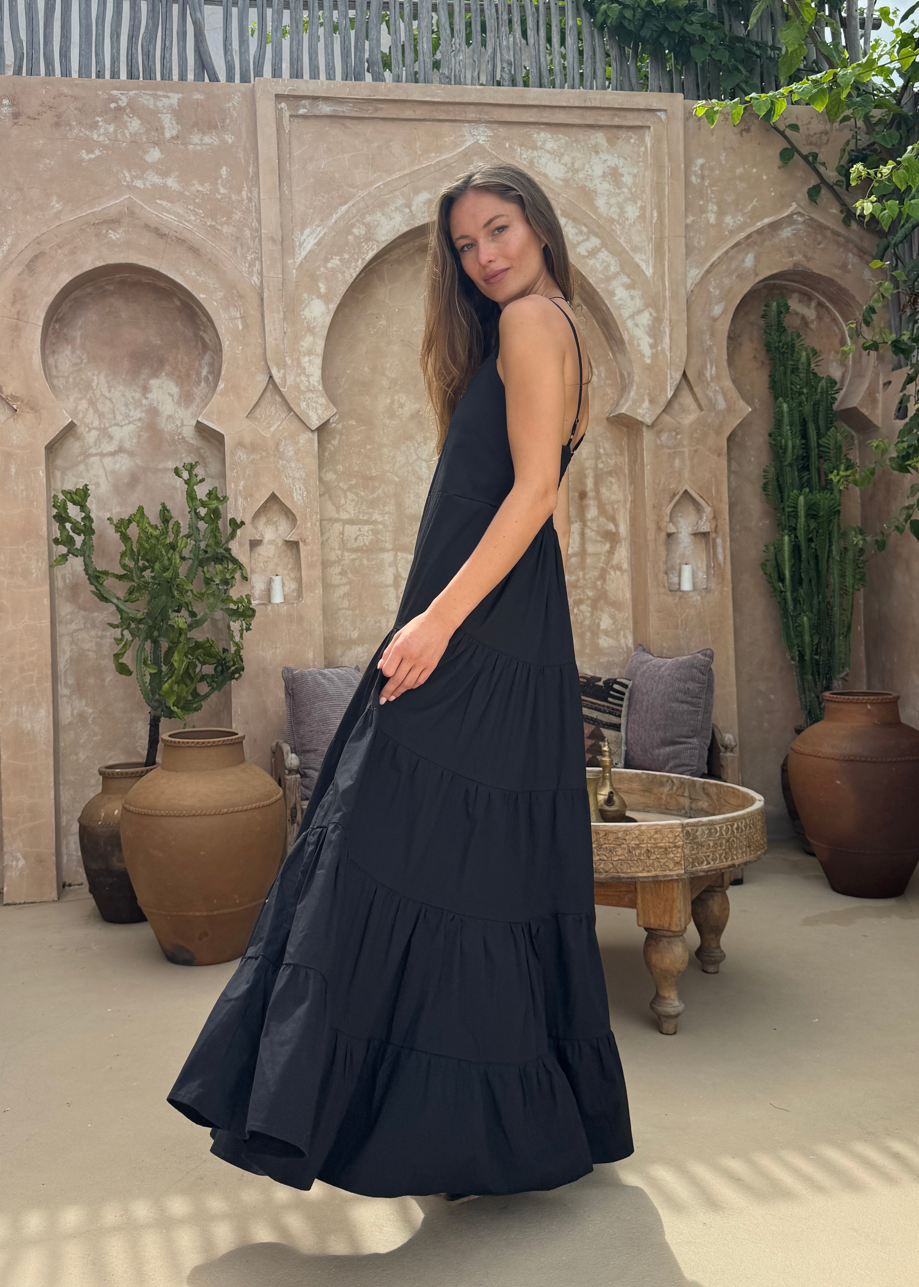 Black tiered cotton Waverly Dress Nantucket coastal evening outfit summer 2026, flowy adjustable strap maxi dress for East Coast summer occasion