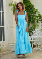 Aqua Bonito cotton ruffle dress detail — voluminous skirt in motion, lightweight hand-dyed cotton, easy beach vacation outfit