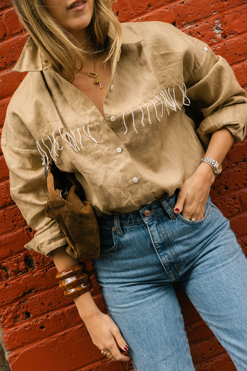 Camel Ulu fringe button-up top by Puka The Label — warm camel linen with white fringe for elevated ranch style fall occasions