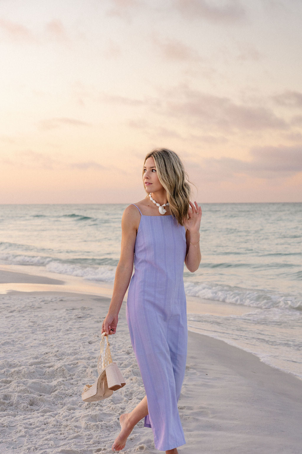 Purple cotton Charli Dress full-length Florida beach outfit at golden hour — summer outfit inspiration from Charli Evans x Puka