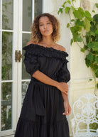 Chic black long gown off the shoulder coastal wedding guest dress idea, elegant flowy cotton maxi for special occasions