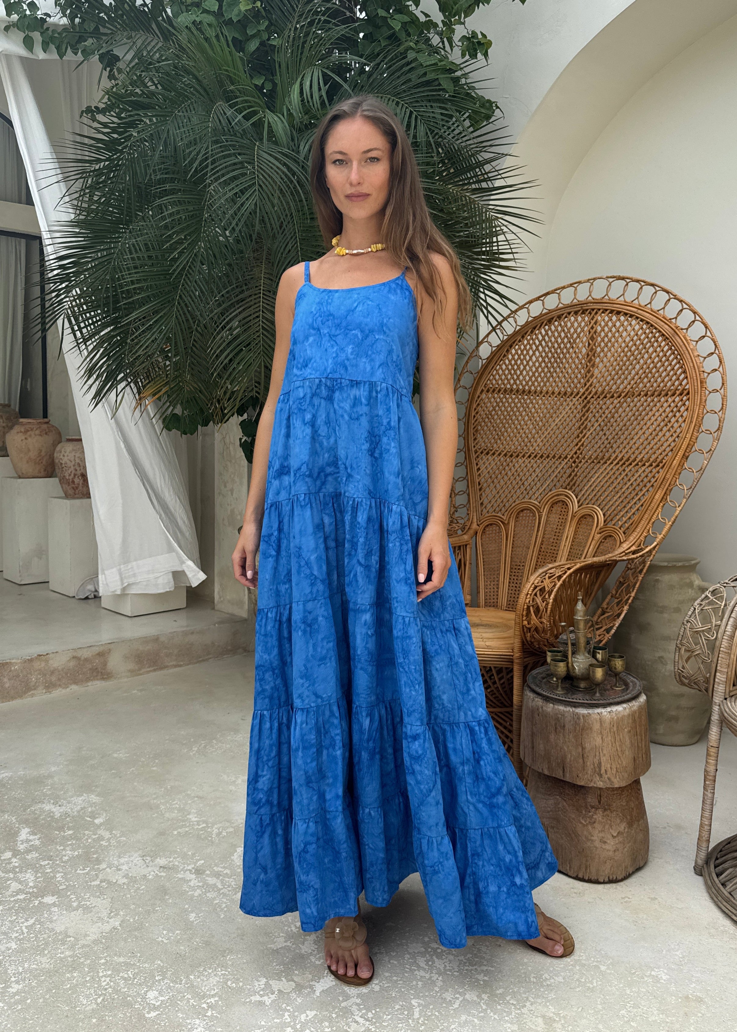 Cobalt blue flowy tiered maxi dress Nantucket and Hamptons summer outfit 2026, vibrant hand-dyed cotton dress for East Coast coastal celebration