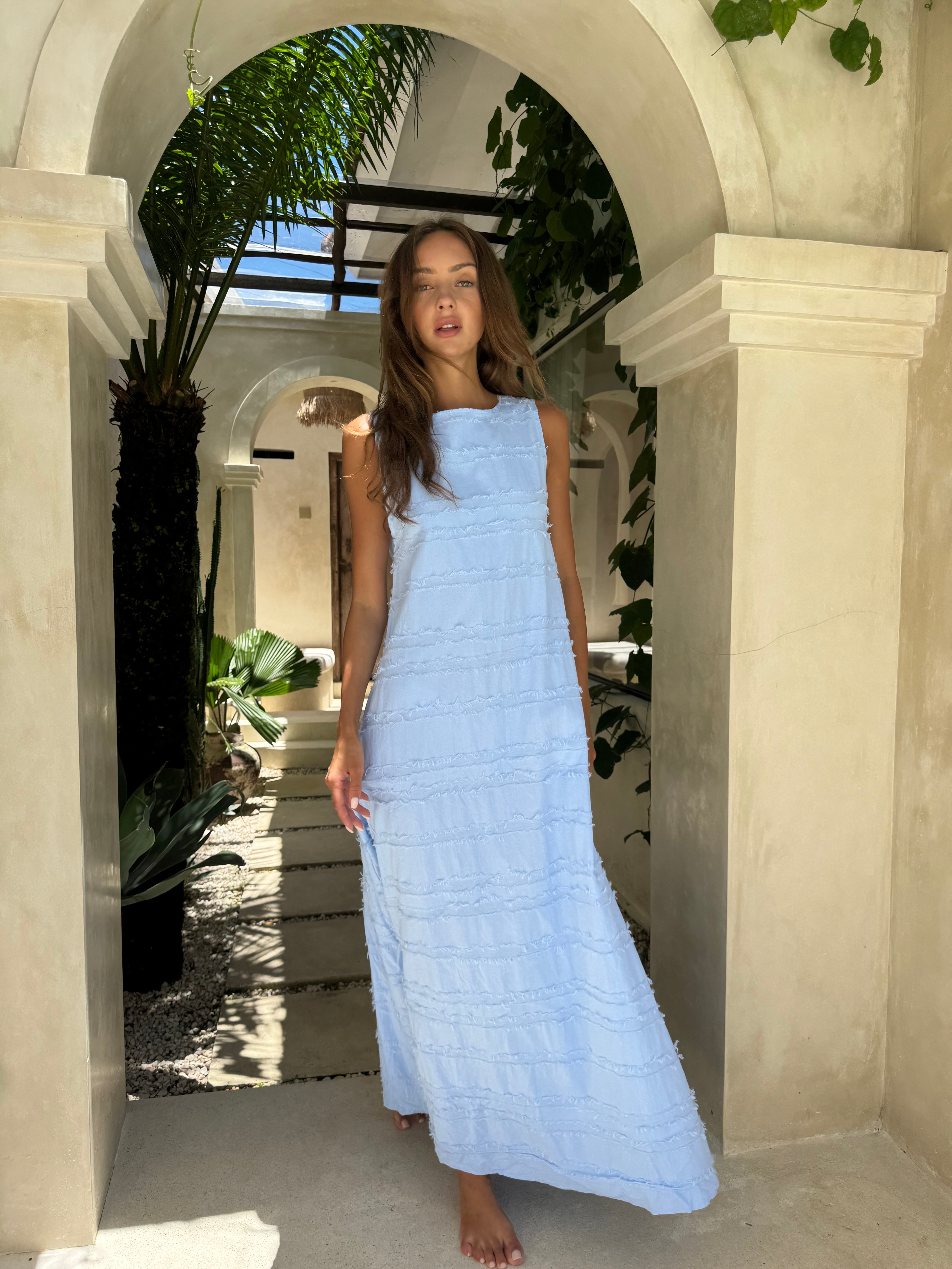 Couper x Puka Exclusive Gili Dress light blue feathered cotton maxi tropical resort summer 2026, bachelorette destination vacation dress Puka The Label