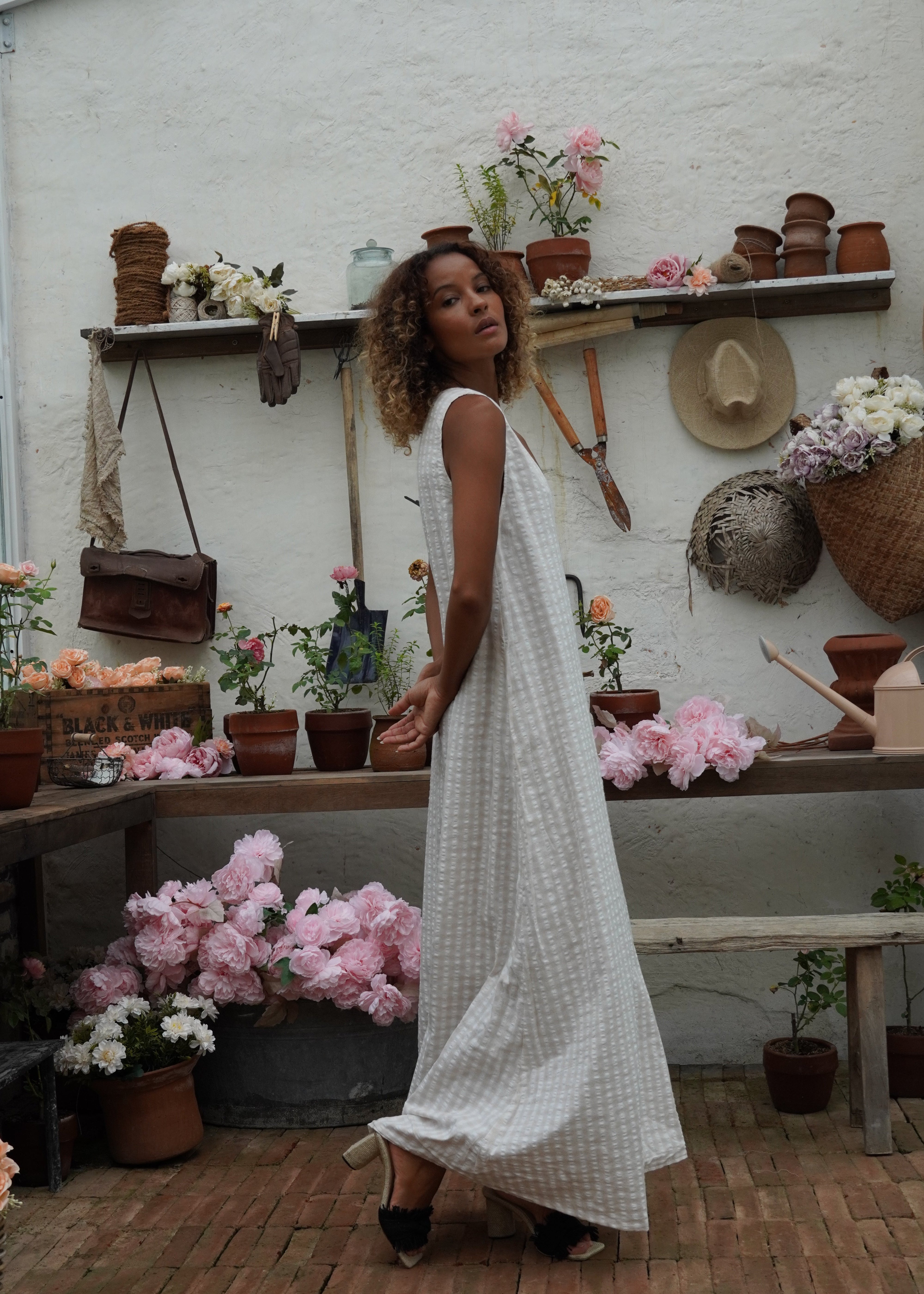 Garden party outfit idea 2026 — long neutral beige maxi with sandals, effortless sophisticated spring style, Puka The Label