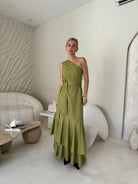 Green hand-dyed cotton maxi dress bridal shower outdoor spring celebration 2026, flowy ruffled silhouette feminine and elegant