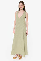 Couper x Puka green gingham maxi Gili dress — elegant baby shower and spring event style
