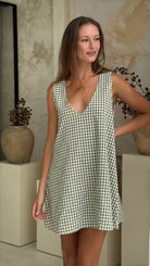 Green gingham mini Gili dress — the perfect Kentucky Derby and spring event outfit by Couper x Puka