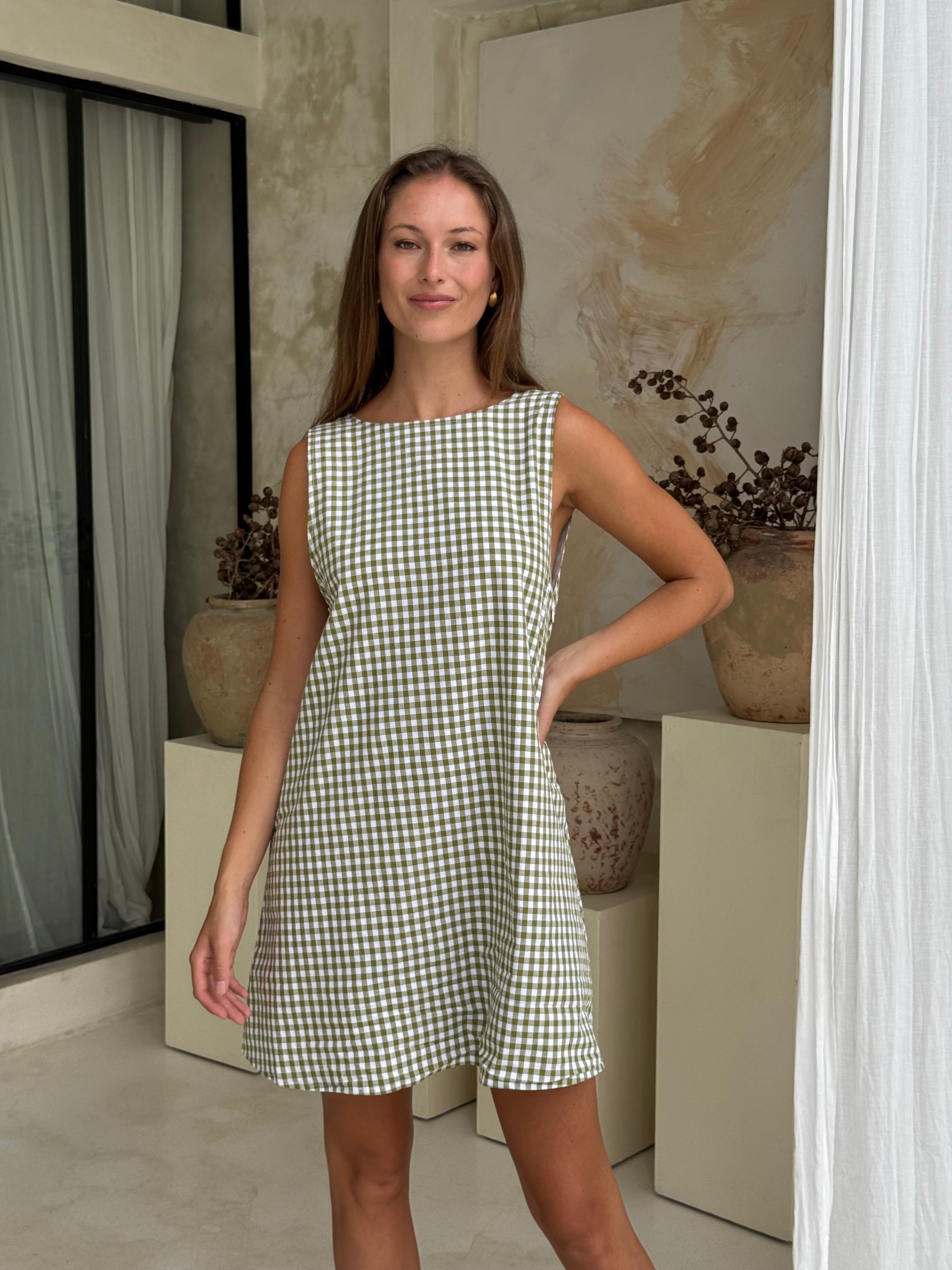 Green gingham mini Gili dress — a fresh, effortless picnic and spring date outfit by Puka The Label