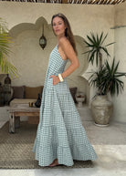 Green gingham tiered cotton Waverly Dress farmers market and coastal summer outfit 2026, effortless preppy maxi dress for warm weather weekend Puka The Label