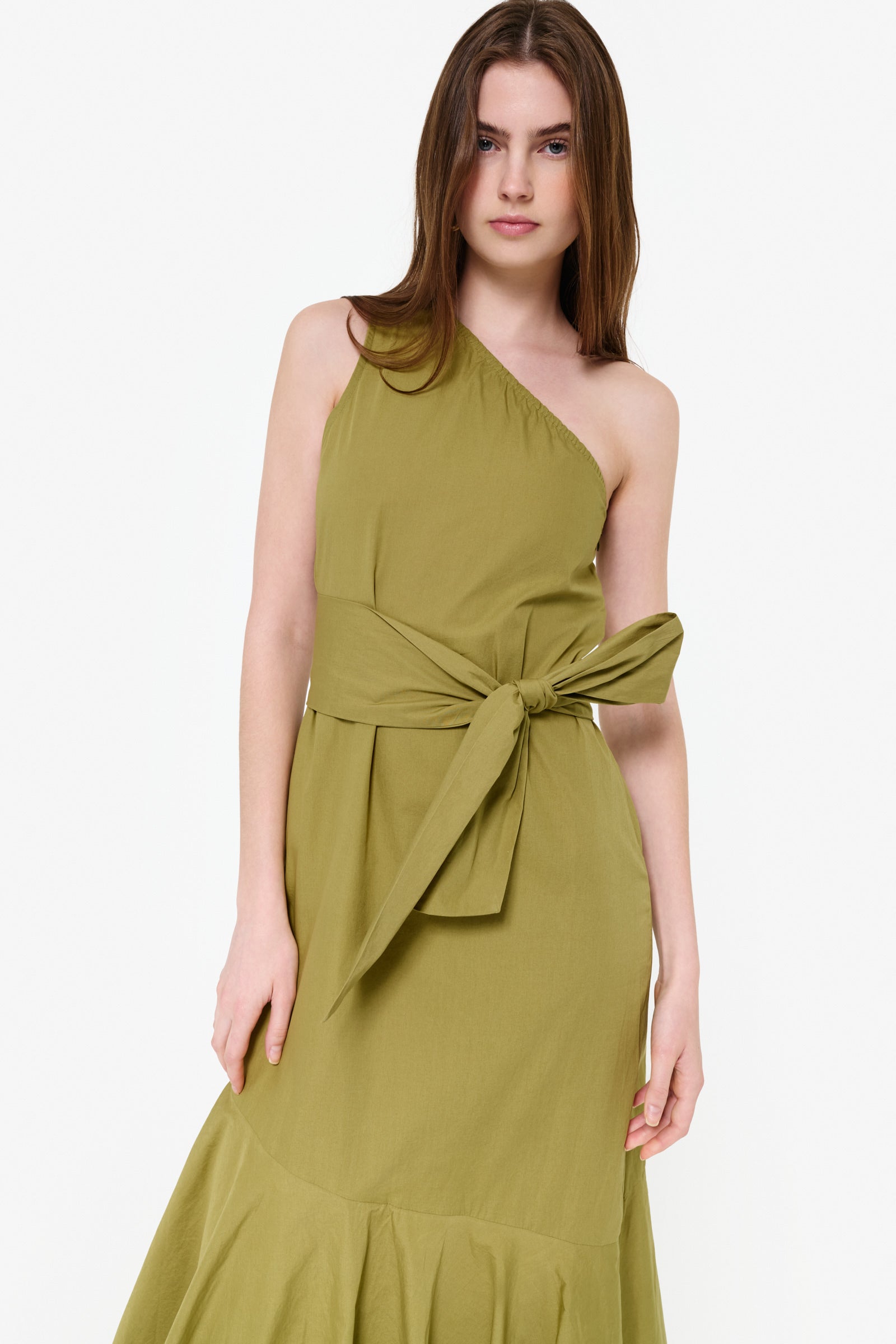 Green maxi dress vacation getaway and tropical resort outfit idea 2026, hand dyed cotton ruffle dress feminine and flowy