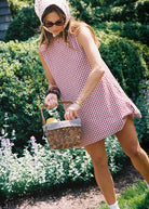 What influencer Hannah Lovey wears in the hamptons. Short red dresses for Summer 2026