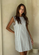 Ice blue stripe Couper x Puka Exclusive Mini Gili dress Nantucket beach summer outfit 2026, chic easy to wear cotton cover-up Puka The Label