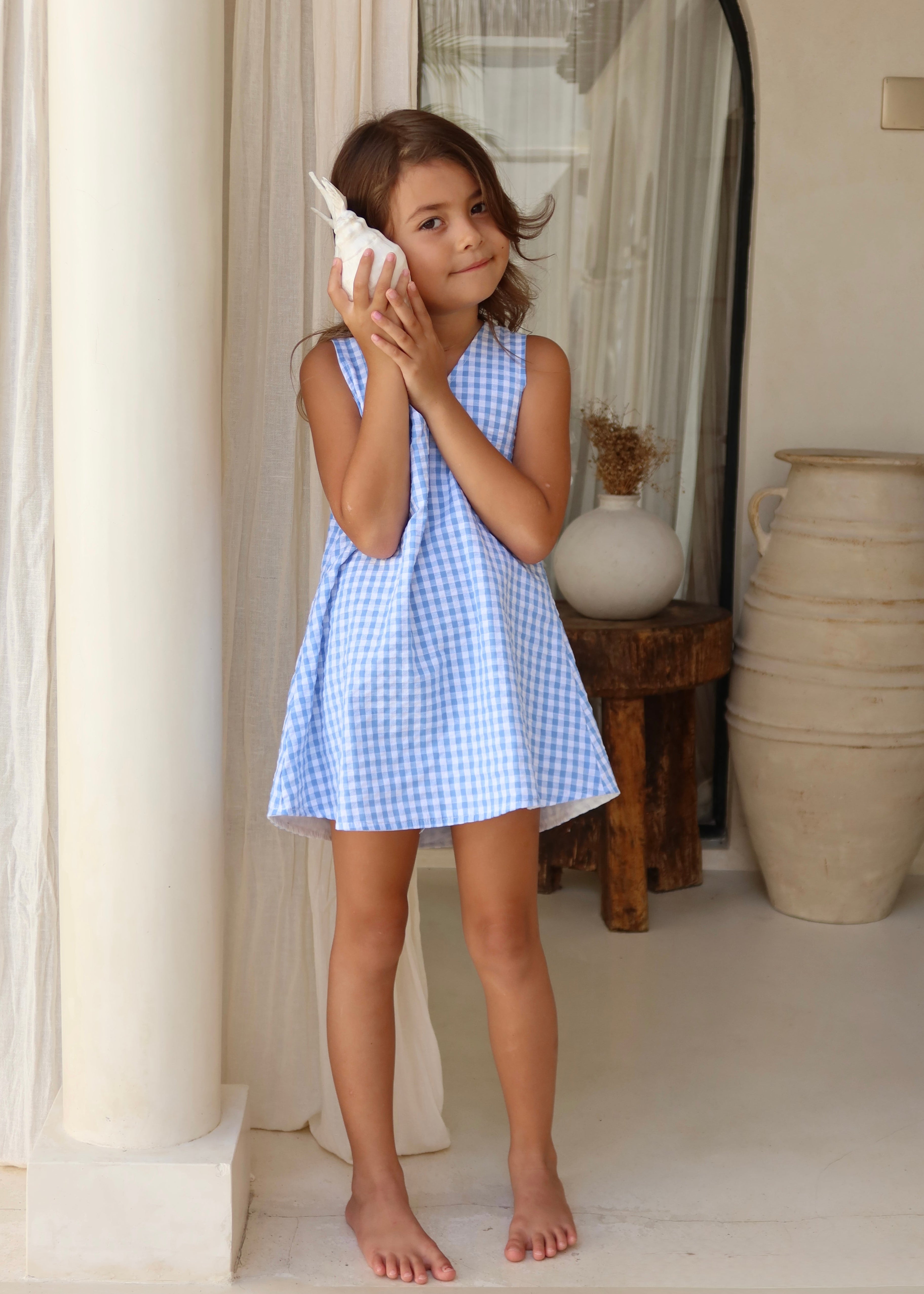Light blue gingham girls cotton dress Easter Sunday outfit 2026, twirl-ready kids dress for spring family photos and outdoor garden celebration