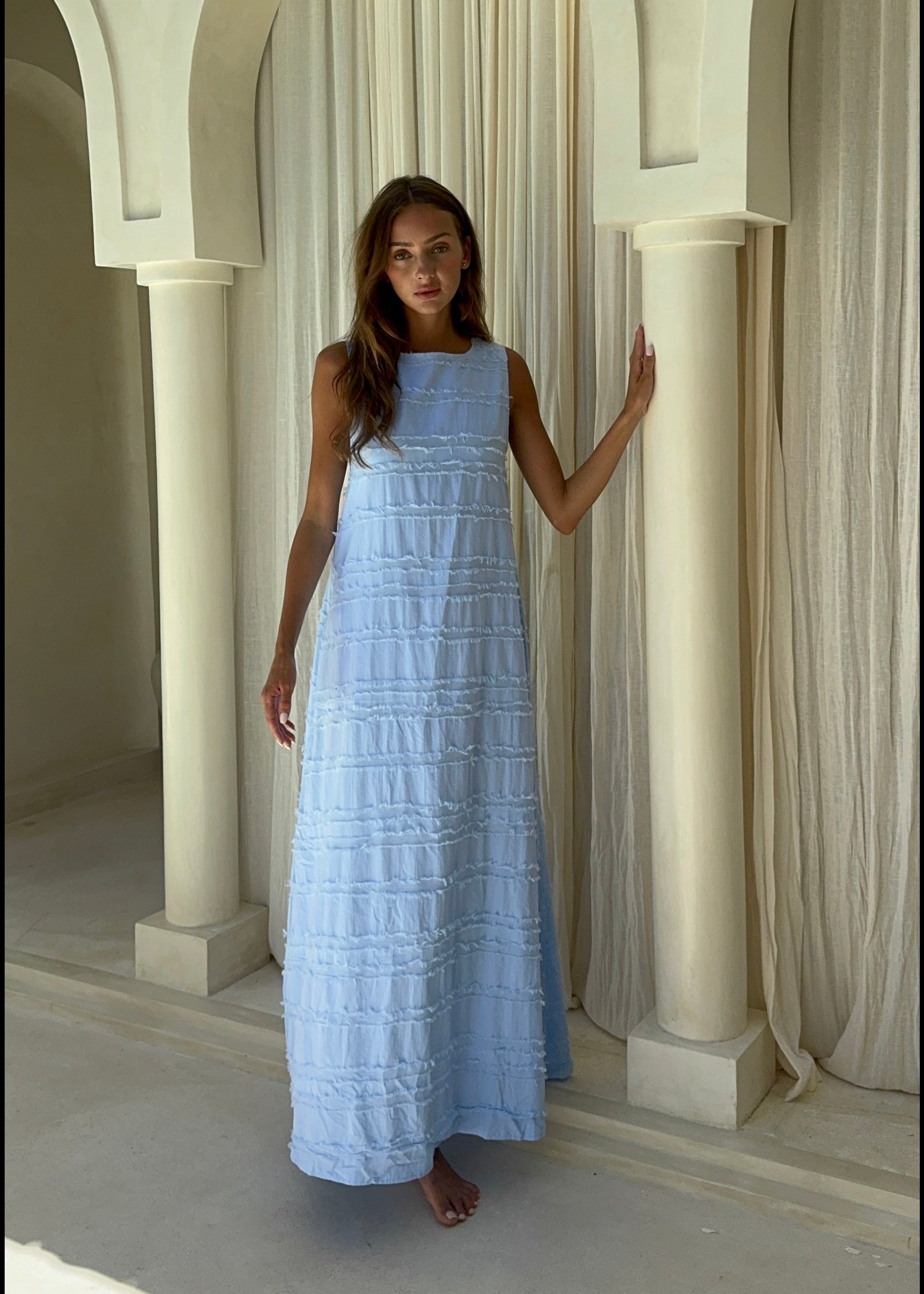 Light blue Couper x Puka Exclusive Gili maxi dress Palm Beach resort summer 2026, easy to wear vibrant textured cotton reversible maxi Puka The Label