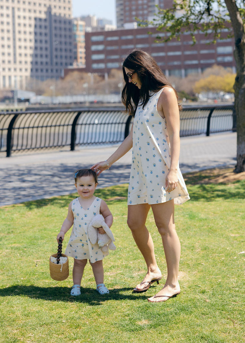 Blue Posey Little Gili and Mini Gili Mommy and Me matching outfits, mother daughter toddler floral dress walking outdoors spring 2026 Puka The Label