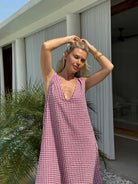 Maroon gingham Gili maxi dress showing reversible V-neck and high neck styling options, Puka The Label