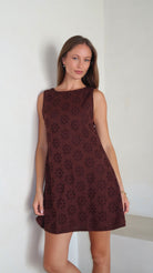 Brown eyelet mini dress — lightweight cotton, fully lined, reversible V-neck or high neck by Couper x Puka