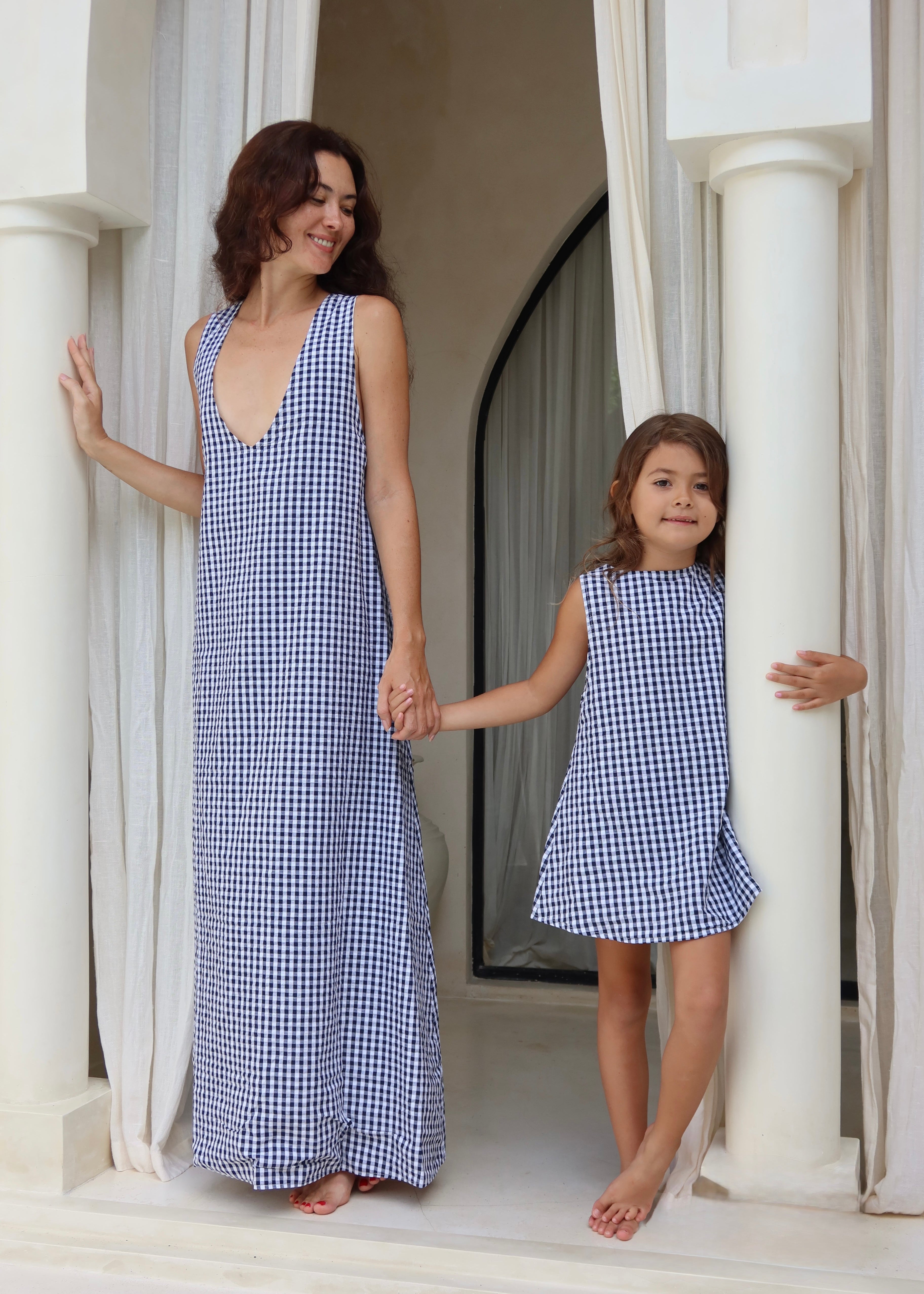 Mother daughter matching navy gingham dresses, Mommy and me coordinating outfits family photo idea summer 2026, Easter family outfit ideas, bright navy dresses