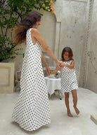 Mother daughter matching polka dot dresses Mother's Day 2026 outfit idea, preppy mommy and me cotton maxi dress for spring brunch and celebrations

