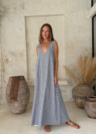 Navy gingham strapless maxi dress 4th of July outfit idea, patriotic summer celebration dress women 2026. Easter outfit ideas 2026