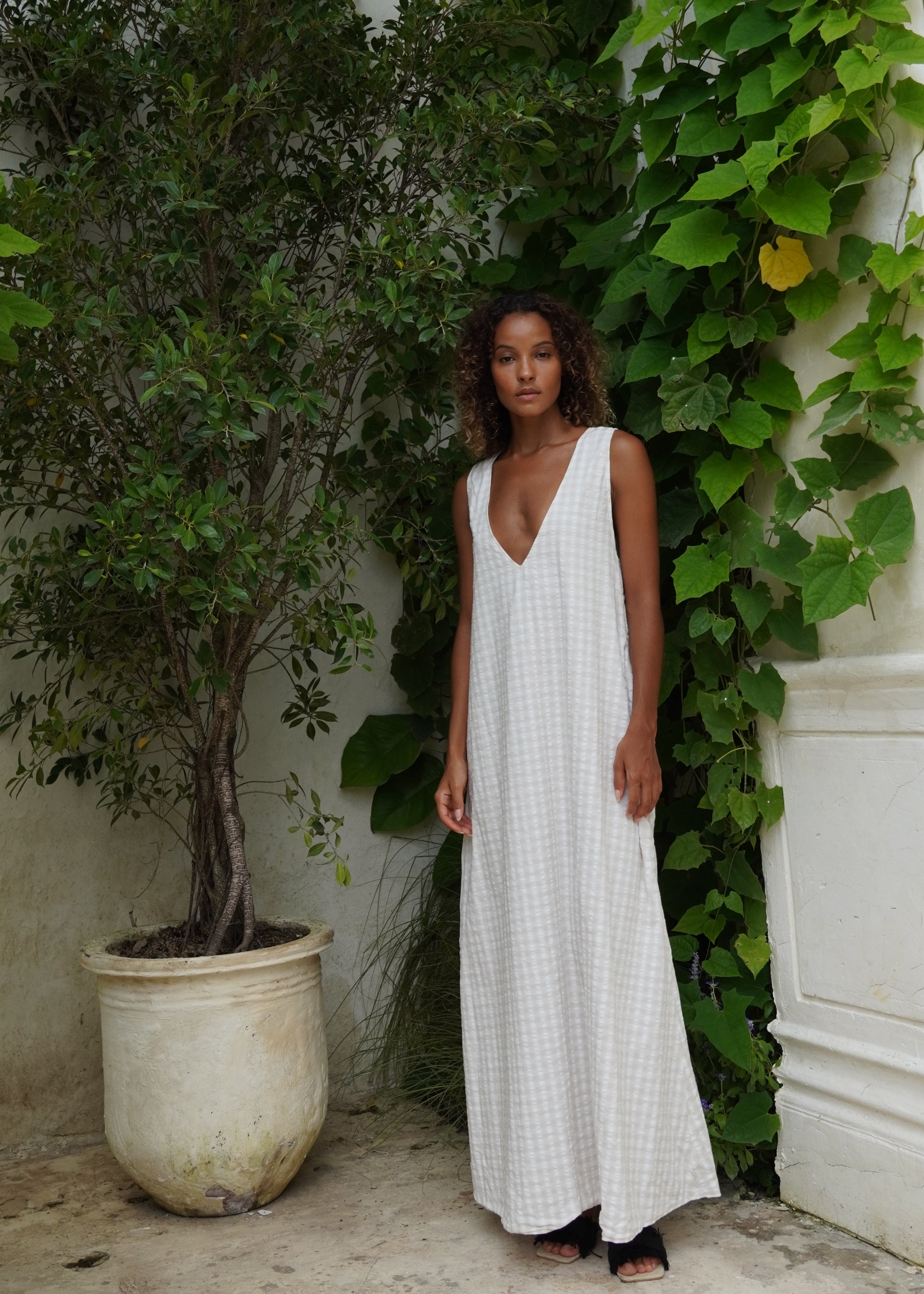 What to wear in Nantucket or Palm Beach — chic neutral check maxi, sophisticated everyday vacation look, Puka The Label