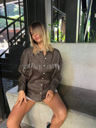 Olive Ulu fringe top by Puka The Label styled for Round Top Texas — elevated western button-up in olive with black & white fringe