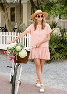 Pink gingham Ripley Dress Puka x Charli Evans collaboration, cotton button-up mini dress inspired by Seaside 30A beach vacation summer 2026