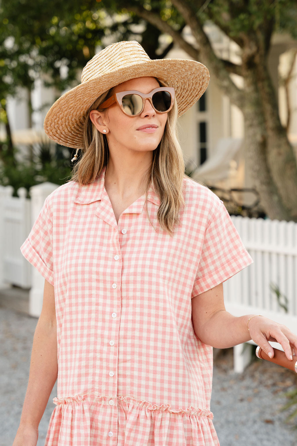 Pink gingham Ripley Dress Nantucket summer weekend outfit 2026, preppy feminine cotton mini dress for East Coast coastal getaway. Dresses that Charli Evans wears