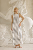 Polka dot cotton dress Memorial Day weekend outfit 2026, classic black and white maxi dress for outdoor BBQ, lake house, and summer kickoff party
