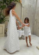 Polka dot mommy and me matching girls dress Mother's Day brunch outfit 2026, classic black and white toddler dress for spring celebration