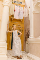 Polka dot maxi dress bump friendly baby shower outfit 2026, comfortable cotton dress for spring celebration and outdoor garden shower
