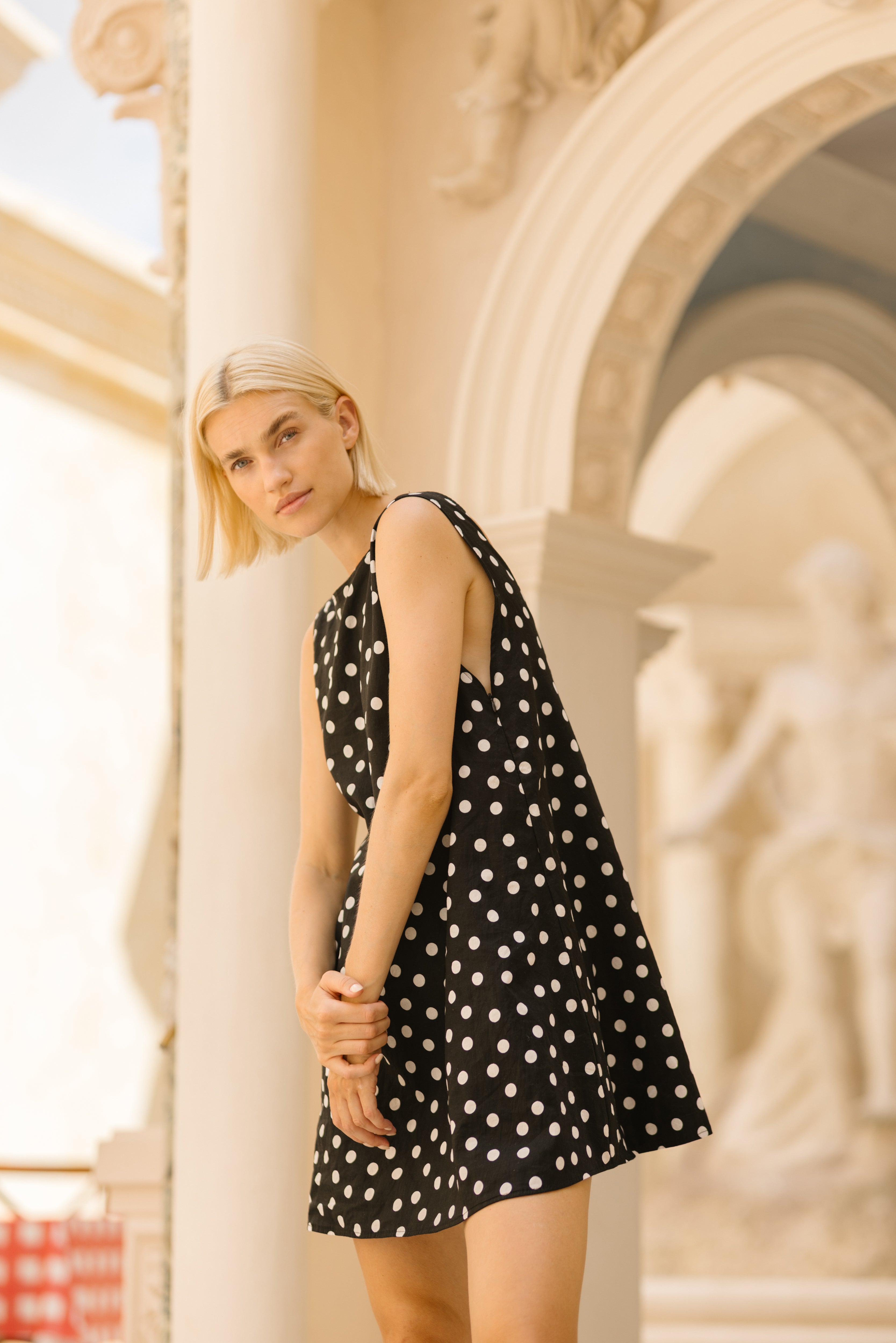 Polka dot mini dress graduation party outfit 2026, playful black and white cotton dress for outdoor celebration, garden event, and summer outing