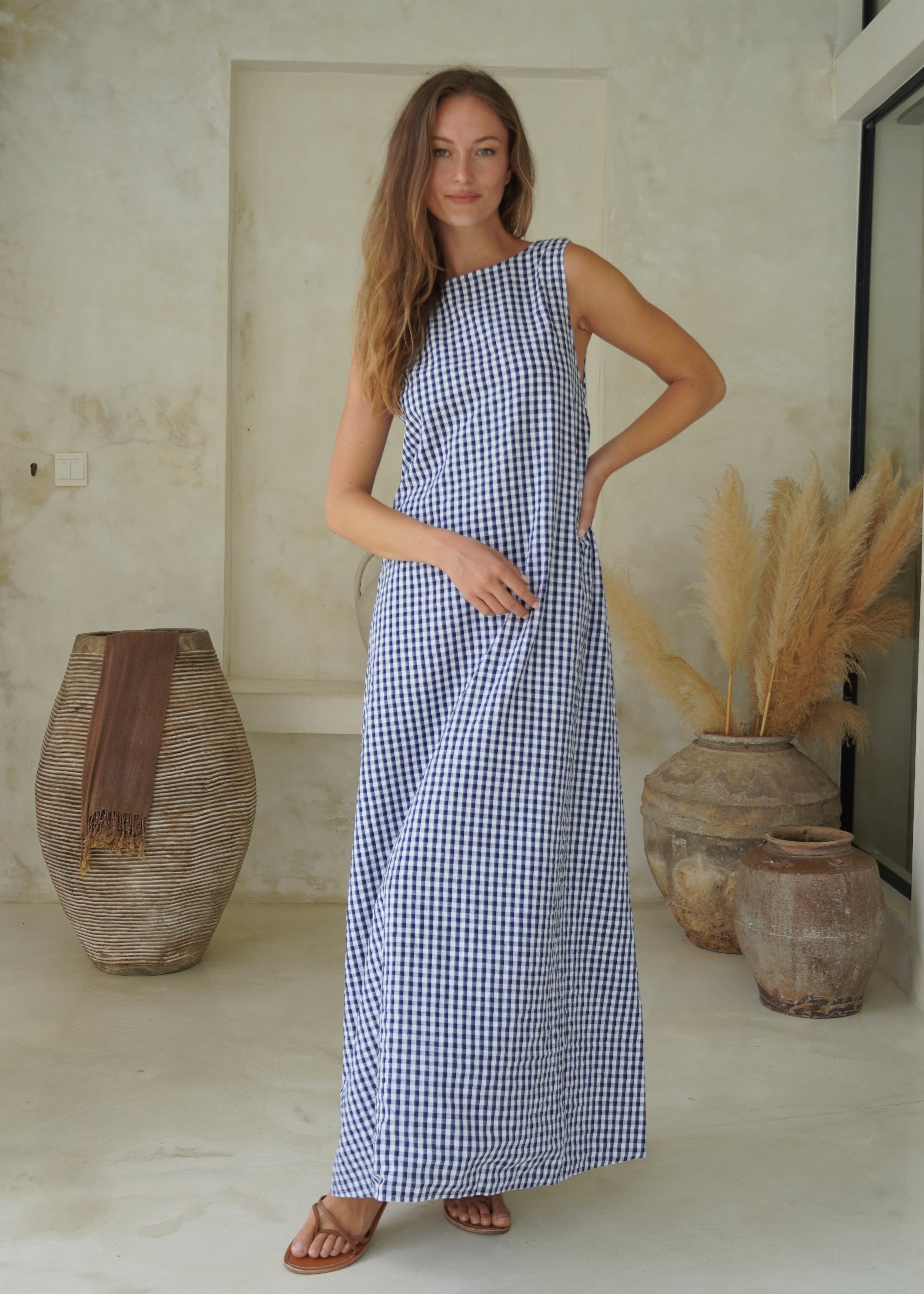 Preppy navy gingham maxi dress summer BBQ and wedding guest outfit idea, classic American coastal style 2026. High neckline easy to wear dresses