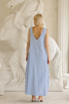 Reversible light blue gingham maxi dress front view — beach to brunch outfit, Puka The Label