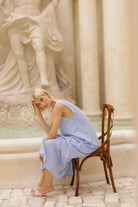 Light blue gingham maxi dress worn with high neck — bump-friendly resort wear, Puka The Label