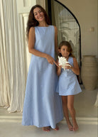 Matching mommy and me light blue gingham dresses on beach vacation, Puka The Label